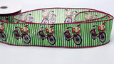 PerpetualRibbons Spring 2.5 inch Green & White Striped Wired Ribbon that features a Pink Bicycle with a Basket of Spring Flowers - 10 Yards 10 Yards 2.5 inch Spring Bicycle Ribbon | Perpetual Ribbons