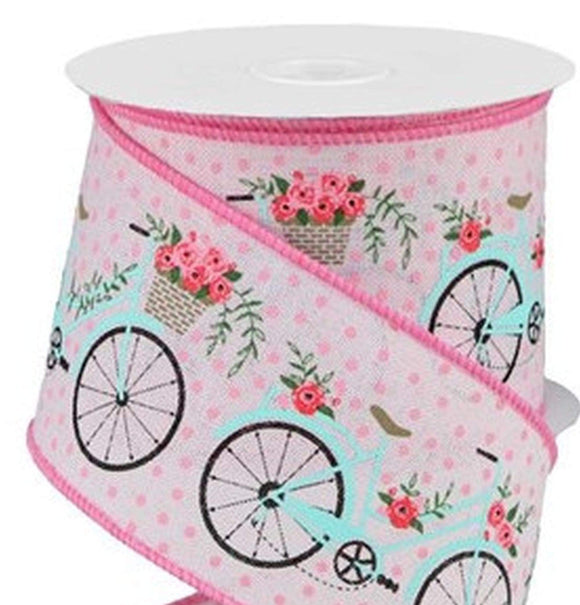PerpetualRibbons Spring 2.5 inch Powder Pink Wired Ribbon that features a Light Blue Bicycle with a Basket of Spring Flowers - 10 Yards